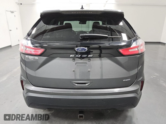 2021 Ford Edge SE z VIN 2FMPK4G95MBA23228, wystawiony jako Copart lot #51947405 z przebiegiem 80 522 mil mil oraz Czysty tytuł • Clean title. Historia ofert i sprzedaży dostępna na DreamBid. Obrazek 6.