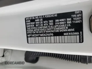 2021 Porsche Cayenne E-Hybrid Hybrid z VIN WP1AE2AY1MDA24696, wystawiony jako Copart lot #54376945 z przebiegiem 36 303 mil mil oraz Szkoda całkowita • Salvage title. Historia ofert i sprzedaży dostępna na DreamBid. Obrazek 13.