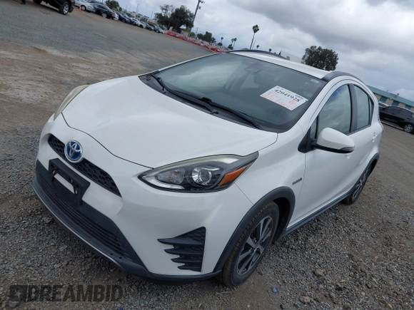 2018 Toyota Prius One with VIN JTDKDTB35J1615449, listed as a IAAI auction lot 42041928 with 59,870 mi miles and . Bid and sale history available at DreamBid. Image 17.
