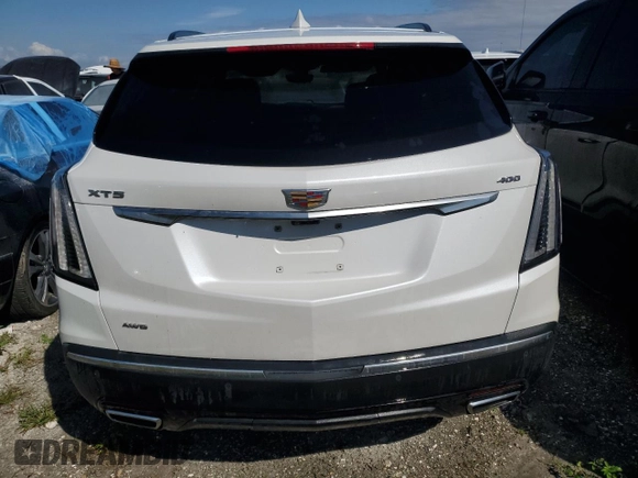 2023 Cadillac XT5 AWD Sport with VIN 1GYKNGRS4PZ191199, listed as a Copart auction lot 74790394 with 17,281 mi miles and Non repairable. Bid and sale history available at DreamBid. Image 6.