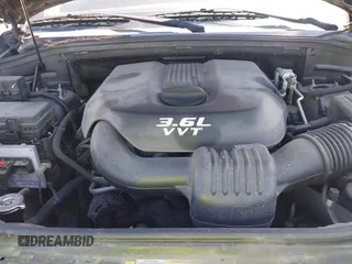 2012 Jeep Grand Cherokee Laredo with VIN 1C4RJEAG9CC223167, listed as a IAAI auction lot 42136098 with 152,715 mi miles. Bid and sale history available at carsss.com. Image 10.