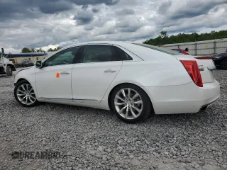 2016 Cadillac XTS Luxury Collection with VIN 2G61M5S34G9209483, listed as a Copart auction lot 54611105 with 23,778 mi miles and Salvage title. Bid and sale history available at DreamBid. Image 2.