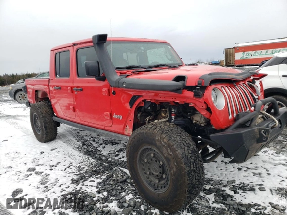 2020 Jeep Gladiator Overland with VIN 1C6HJTFG9LL152701, listed as a Copart auction lot 80737794 with 61,654 mi miles and Salvage title. Bid and sale history available at DreamBid. Image 4.
