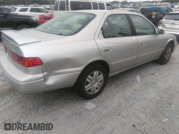 2001 Toyota Camry CE z VIN 4T1BG22K11U803209, wystawiony jako IAAI lot #40770527 z przebiegiem 210 611 mil mil oraz . Historia ofert i sprzedaży dostępna na DreamBid. Obrazek 4.