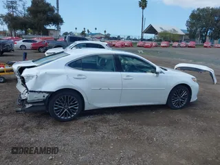 2013 Lexus ES 4dr Sdn with VIN JTHBK1GG9D2014631, listed as a IAAI auction lot 41931985 with 168,385 mi miles. Bid and sale history available at carsss.com. Image 14.