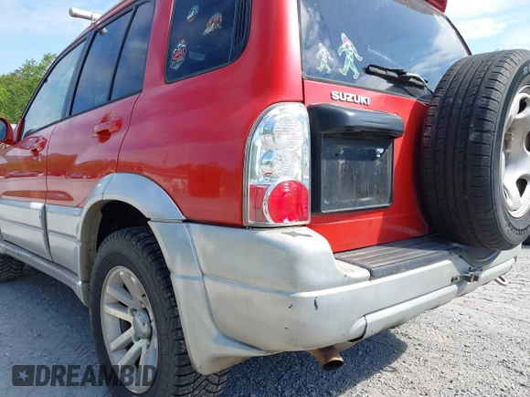 2005 Suzuki Grand Vitara LX with VIN JS3TD62VX54201211, listed as a IAAI auction lot 42220221 with 242,165 mi miles and . Bid and sale history available at DreamBid. Image 17.