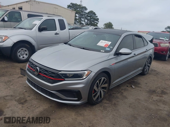 2019 Volkswagen Jetta GLI S z VIN 3VW5T7BU4KM165083, wystawiony jako IAAI lot #40729763 z przebiegiem 75 414 mil mil oraz . Historia ofert i sprzedaży dostępna na DreamBid. Obrazek 2.