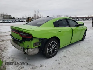 2019 Dodge Charger SXT with VIN 2C3CDXJG1KH706449, listed as a Copart auction lot 85907394 with 147,526 mi miles and Salvage Title. Bid and sale history available at DreamBid. Image 3.