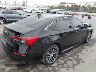 2022 Honda Civic Sedan Touring with VIN 2HGFE1F91NH308547, listed as a IAAI auction lot 41882514 with 39,249 mi miles. Bid and sale history available at carsss.com. Image 4.