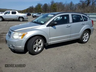 2010 Dodge Caliber SXT with VIN 1B3CB4HA6AD540167, listed as a Copart auction lot 51073465 with 81,148 mi miles and Salvage Title. Bid and sale history available at DreamBid. Image 1.