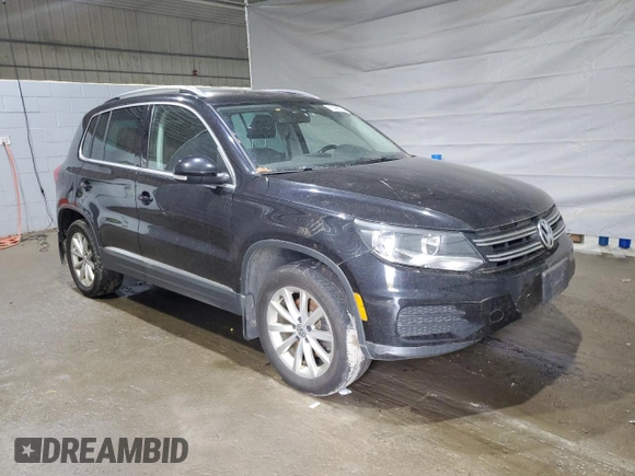 2017 Volkswagen Tiguan Wolfsburg Edition with VIN WVGSV7AX0HW502932, listed as a Copart auction lot 61498075 with 133,479 mi miles and Clean title. Bid and sale history available at DreamBid. Image 4.