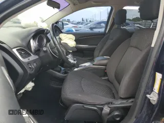 2013 Dodge Journey SE with VIN 3C4PDCAB7DT680055, listed as a Copart auction lot 58241435 with 199,620 mi miles and Salvage title. Bid and sale history available at DreamBid. Image 7.