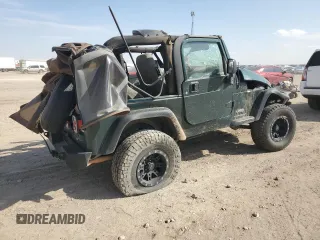2005 Jeep Wrangler SE with VIN 1J4FA29175P331391, listed as a Copart auction lot 76608824 with 98,268 mi miles and Salvage Title. Bid and sale history available at carsss.com. Image 3.