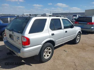 2001 Isuzu Rodeo S with VIN 4S2DM58WX14352481, listed as a IAAI auction lot 41796652 with 162,696 mi miles and . Bid and sale history available at DreamBid. Image 4.