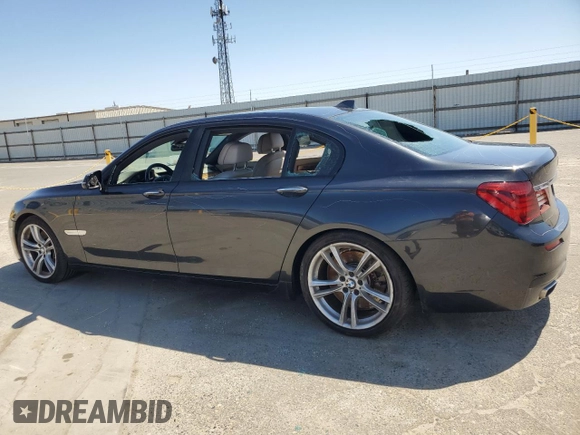 2014 BMW 7 Series ALPINA B7 with VIN WBAYE8C55ED136454, listed as a Copart auction lot 55589525 with 119,761 mi miles and Salvage title. Bid and sale history available at DreamBid. Image 2.