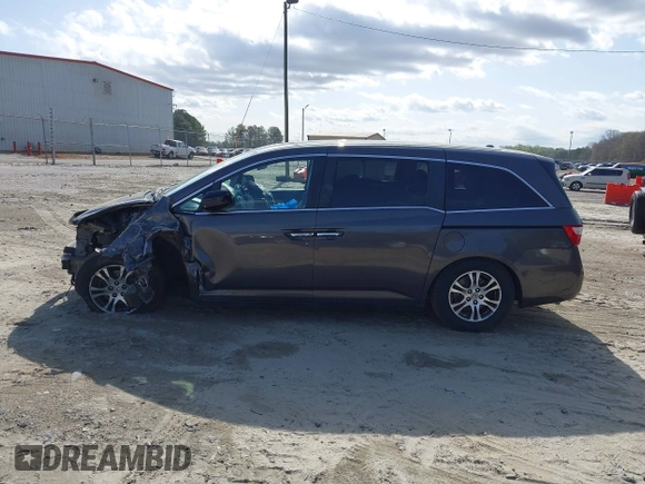 2013 Honda Odyssey EX-L with VIN 5FNRL5H62DB035649, listed as a IAAI auction lot 41849123 with 176,392 mi miles and . Bid and sale history available at carsss.com. Image 14.