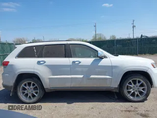 2014 Jeep Grand Cherokee Summit z VIN 1C4RJFJG3EC213145, wystawiony jako IAAI lot #41918145 z przebiegiem 176 460 mil mil oraz . Historia ofert i sprzedaży dostępna na DreamBid. Obrazek 13.