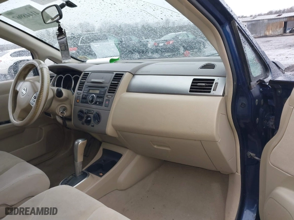 2008 Nissan Versa 1.8 SL with VIN 3N1BC13EX8L388854, listed as a IAAI auction lot 41448967 with 182,944 mi miles. Bid and sale history available at carsss.com. Image 5.