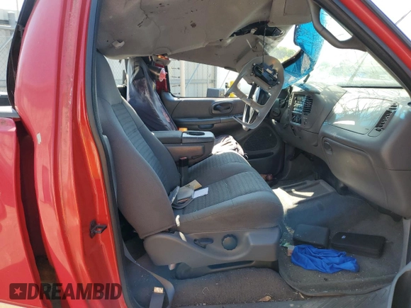 2001 Ford F-150 XL z VIN 2FTRF18W21CA50638, wystawiony jako Copart lot #53474355 z przebiegiem Nie podano mil oraz Nie do naprawy • Non repairable. Historia ofert i sprzedaży dostępna na DreamBid. Obrazek 10.