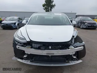 2019 Tesla Model 3 Long Range with VIN 5YJ3E1EB2KF361541, listed as a IAAI auction lot 41859373 with 54,664 mi miles. Bid and sale history available at carsss.com. Image 13.