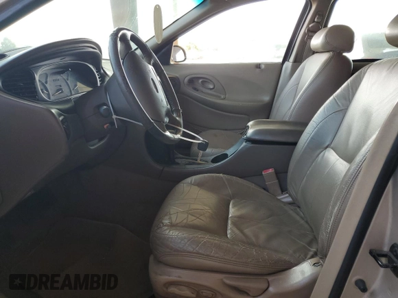 1998 Ford Taurus SE Comfort with VIN 1FAFP53S3WG213045, listed as a Copart auction lot 61653315 with 111,014 mi miles and Salvage title. Bid and sale history available at DreamBid. Image 7.