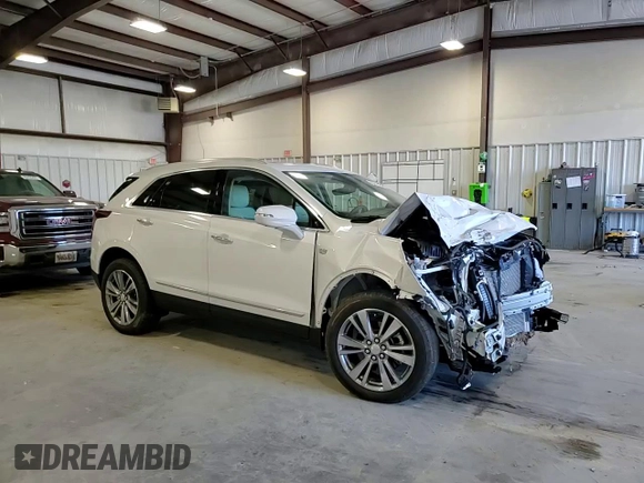 2025 Cadillac XT5 FWD Premium Luxury with VIN 1GYKNCRSXSZ106707, listed as a Copart auction lot 86919854 with 1,879 mi miles and Salvage Title. Bid and sale history available at DreamBid. Image 12.