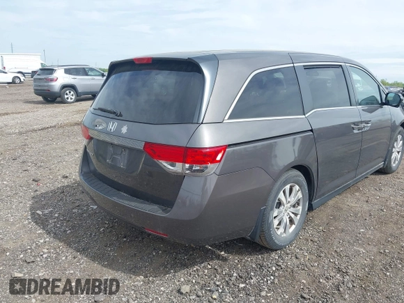 2015 Honda Odyssey EX with VIN 5FNRL5H42FB054557, listed as a IAAI auction lot 42249824 with 199,147 mi miles and . Bid and sale history available at DreamBid. Image 4.