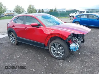 2024 Mazda CX-30 S Carbon Edition z VIN 3MVDMBCM1RM704376, wystawiony jako IAAI lot #42194116 z przebiegiem 2493 mil mil oraz . Historia ofert i sprzedaży dostępna na DreamBid. Obrazek 1.