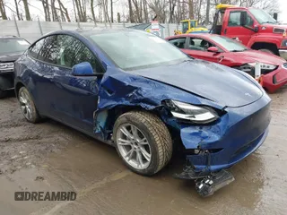 2022 Tesla Model Y Long Range z VIN 7SAYGDEE2NF421448, wystawiony jako IAAI lot #41619301 z przebiegiem 44 562 mil mil oraz . Historia ofert i sprzedaży dostępna na DreamBid. Obrazek 1.