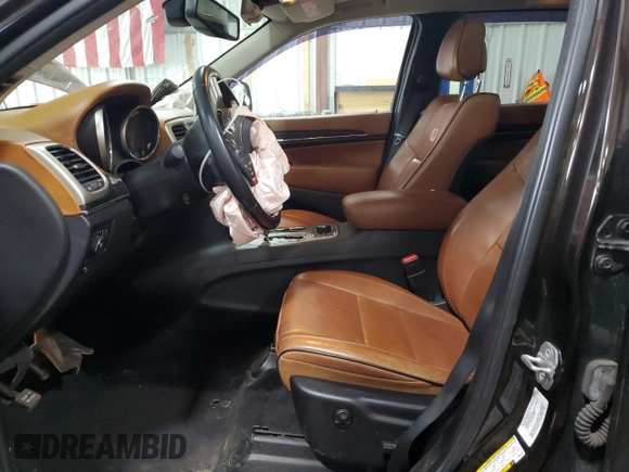 2013 Jeep Grand Cherokee Overland with VIN 1C4RJFCT7DC587329, listed as a Copart auction lot 53432625 with 98,938 mi miles and Salvage Title. Bid and sale history available at carsss.com. Image 7.
