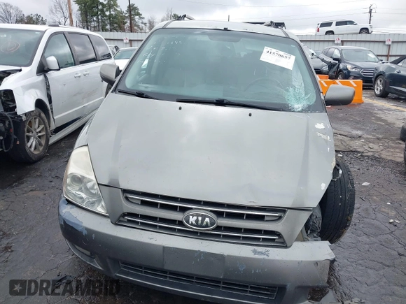 2010 Kia Sedona EX with VIN KNDMH4C33A6342127, listed as a IAAI auction lot 41570657 with 249,395 mi miles. Bid and sale history available at carsss.com. Image 12.