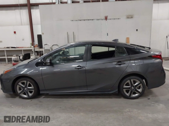 2020 Toyota Prius L Eco with VIN JTDKARFU1L3117299, listed as a IAAI auction lot 42544586 with 42,560 mi miles and . Bid and sale history available at DreamBid. Image 14.