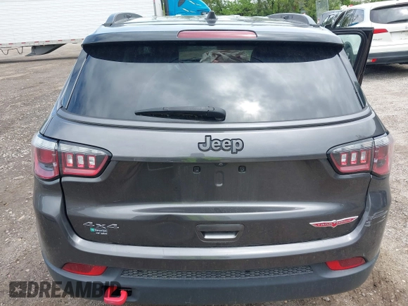 2020 Jeep Compass Trailhawk with VIN 3C4NJDDB3LT200268, listed as a IAAI auction lot 42250192 with 73,804 mi miles and . Bid and sale history available at DreamBid. Image 16.
