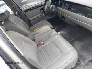 1998 Lincoln Town Car Signature with VIN 1LNFM82WXWY659028, listed as a IAAI auction lot 42265774 with 164,400 mi miles and . Bid and sale history available at DreamBid. Image 5.