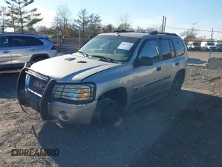 2002 GMC Envoy SLT with VIN 1GKDT13S822304832, listed as a IAAI auction lot 40874054 with 132,883 mi miles. Bid and sale history available at carsss.com. Image 2.