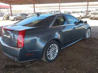 2010 Cadillac CTS with VIN 1G6DK5EG0A0141007, listed as a IAAI auction lot 41841972 with 142,898 mi miles and . Bid and sale history available at DreamBid. Image 4.