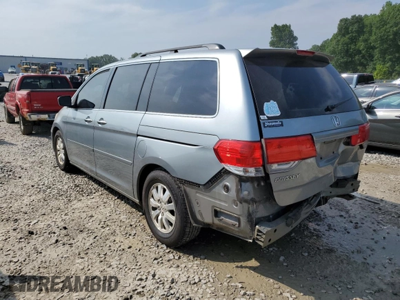 2010 Honda Odyssey EX with VIN 5FNRL3H48AB086975, listed as a Copart auction lot 60258265 with 184,344 mi miles and Salvage title. Bid and sale history available at DreamBid. Image 2.