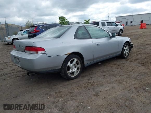 2001 Honda Prelude with VIN JHMBB62481C005533, listed as a IAAI auction lot 42200322 with 85,394 mi miles and . Bid and sale history available at DreamBid. Image 4.