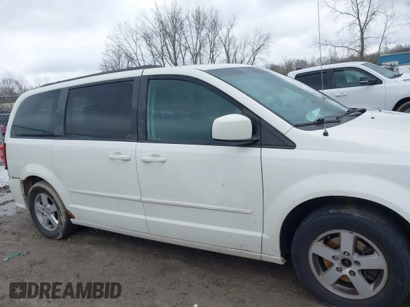 2012 Dodge Grand Caravan SXT with VIN 2C4RDGCG8CR294836, listed as a IAAI auction lot 41995385 with 184,475 mi miles and . Bid and sale history available at DreamBid. Image 12.