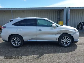 2015 Lexus RX 450h with VIN 2T2ZB1BA4FC002602, listed as a IAAI auction lot 41812562 with 166,220 mi miles and . Bid and sale history available at DreamBid. Image 13.