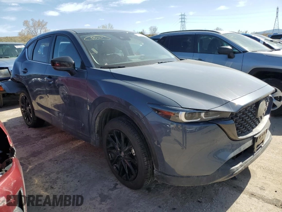 2024 Mazda CX-5 2.5 S Carbon Edition with VIN JM3KFBCMXR0396072, listed as a Copart auction lot 51162695 with 27,457 mi miles and Salvage Title. Bid and sale history available at carsss.com. Image 4.