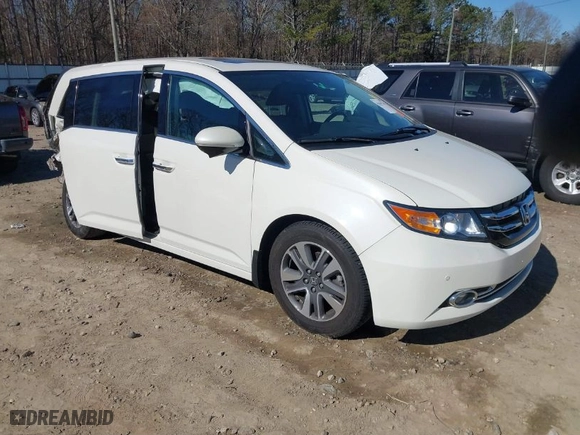 2015 Honda Odyssey Touring Elite with VIN 5FNRL5H92FB091183, listed as a IAAI auction lot 41667530 with 56,807 mi miles. Bid and sale history available at carsss.com. Image 1.