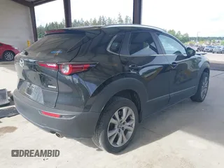 2023 Mazda CX-30 S Carbon Edition with VIN 3MVDMBCMXPM520776, listed as a IAAI auction lot 42205047 with Not provided miles and . Bid and sale history available at DreamBid. Image 4.