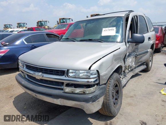 2004 Chevrolet Tahoe LS z VIN 1GNEC13T44R180732, wystawiony jako IAAI lot #42170904 z przebiegiem Nie podano mil oraz . Historia ofert i sprzedaży dostępna na DreamBid. Obrazek 2.