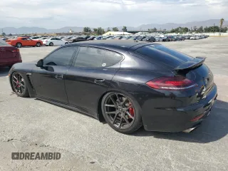 2014 Porsche Panamera Turbo z VIN WP0AC2A72EL073234, wystawiony jako Copart lot #65813464 z przebiegiem 83 918 mil mil oraz Szkoda całkowita • Salvage title. Historia ofert i sprzedaży dostępna na DreamBid. Obrazek 2.