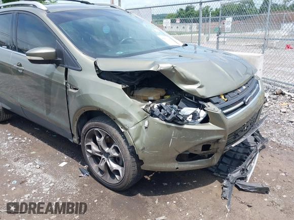 2014 Ford Escape Titanium с VIN 1FMCU0J93EUA92621, выставлен на аукционе IAAI как лот 42531195 с пробегом 170 423 миль миль и . История ставок и продаж доступна на DreamBid. Изображение 6.