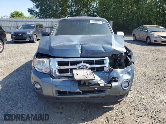 2012 Ford Escape XLT z VIN 1FMCU9DG1CKC54737, wystawiony jako Copart lot #59902055 z przebiegiem 206 067 mil mil oraz Szkoda całkowita • Salvage title. Historia ofert i sprzedaży dostępna na DreamBid. Obrazek 5.