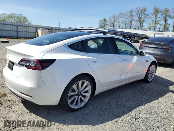 2019 Tesla Model 3 Mid Range with VIN 5YJ3E1EA0KF484178, listed as a Copart auction lot 53121915 with 64,929 mi miles and Salvage Title. Bid and sale history available at DreamBid. Image 3.