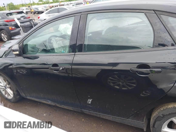 2017 Ford Focus SE z VIN 1FADP3F25HL253466, wystawiony jako IAAI lot #42303404 z przebiegiem 89 779 mil mil oraz . Historia ofert i sprzedaży dostępna na DreamBid. Obrazek 15.