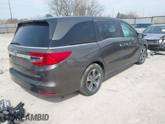 2018 Honda Odyssey Touring with VIN 5FNRL6H83JB008463, listed as a IAAI auction lot 41805044 with 65,001 mi miles. Bid and sale history available at carsss.com. Image 4.